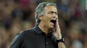 Mourinho banned for jabbing Barca coach's eye