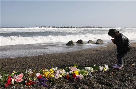 Japan mourns; grapples with tsunami aftermath