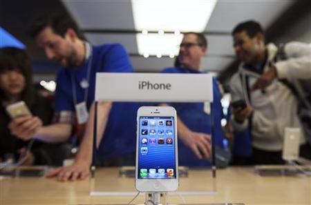 Apple shares fall on reports of cuts to iPhone parts orders