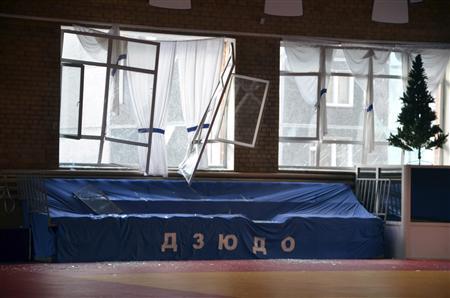 Broken windows and debris are seen inside a sports hall following sightings of a falling object in the sky in the Urals city of Chelyabinsk