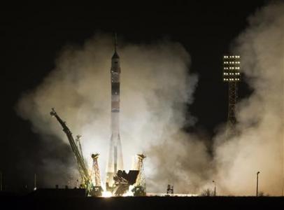 Russian-American crew taking short cut to space station