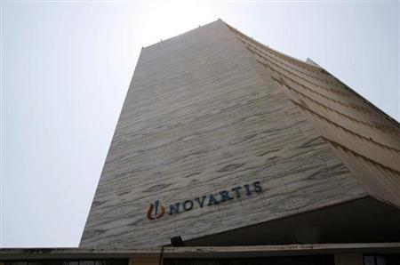 A Novartis logo is pictured on its headquarters building in Mumbai
