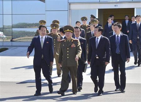 Choe, director of the General Political Bureau of the Korean People's Army of North Korea, walks at Pyongyang airport before leaving for China