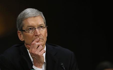 File photo of Apple CEO Cook during Senate homeland security and governmental affairs investigations subcommittee hearing in Washington