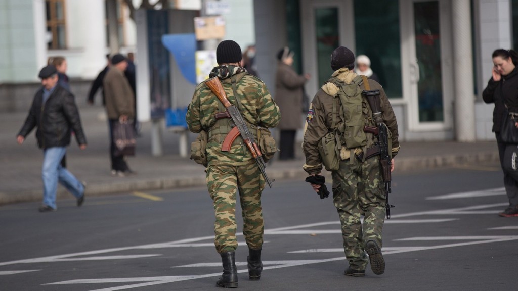 Pro-Russian gunmen patrol the centre of Donetsk in eastern Ukraine on November 12, 2014.